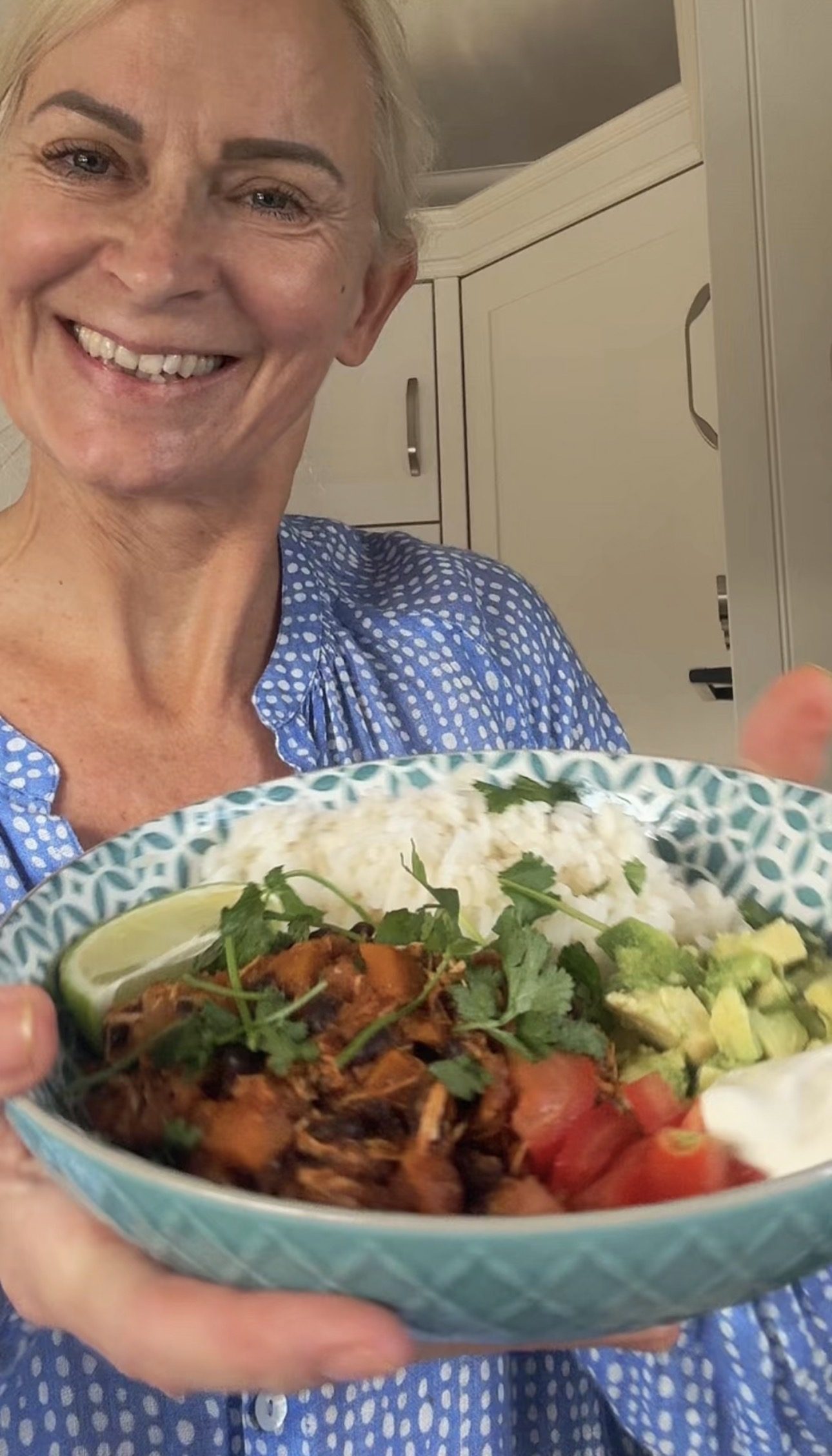 Mel presenting a homemade meal