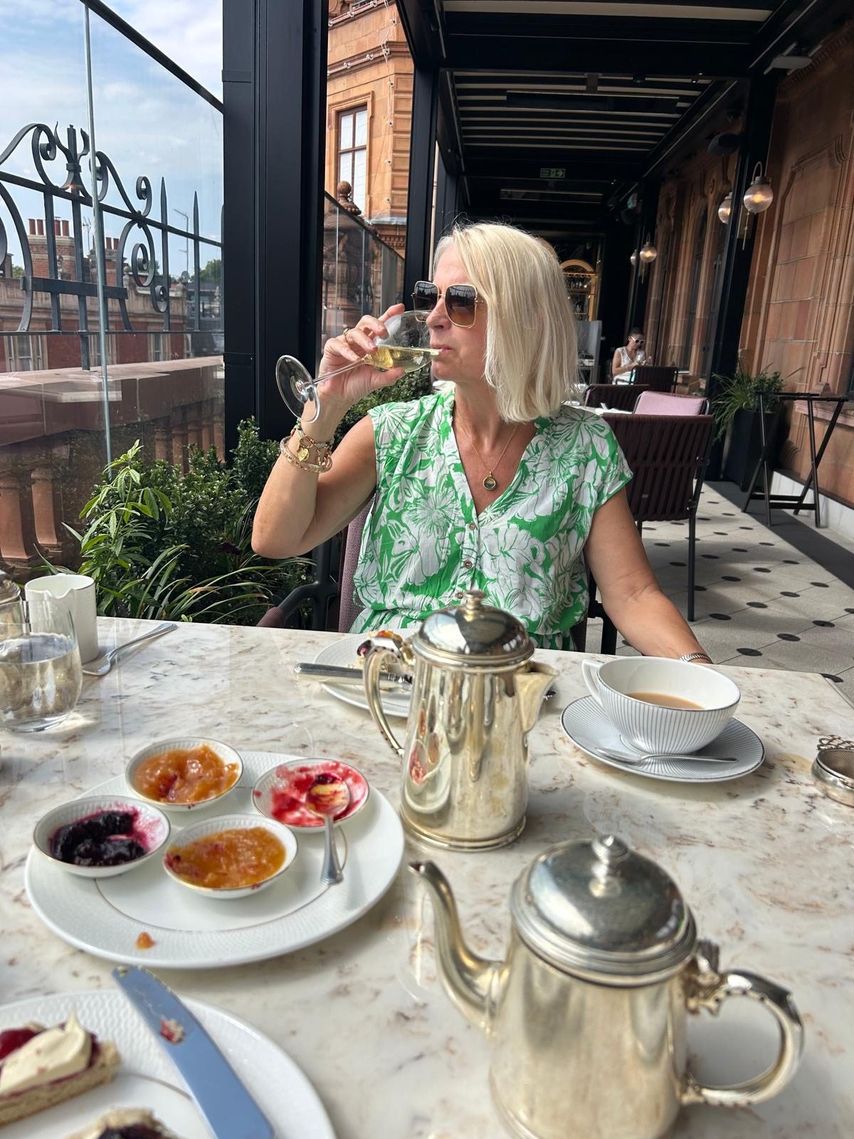 Mel enjoying afternoon tea